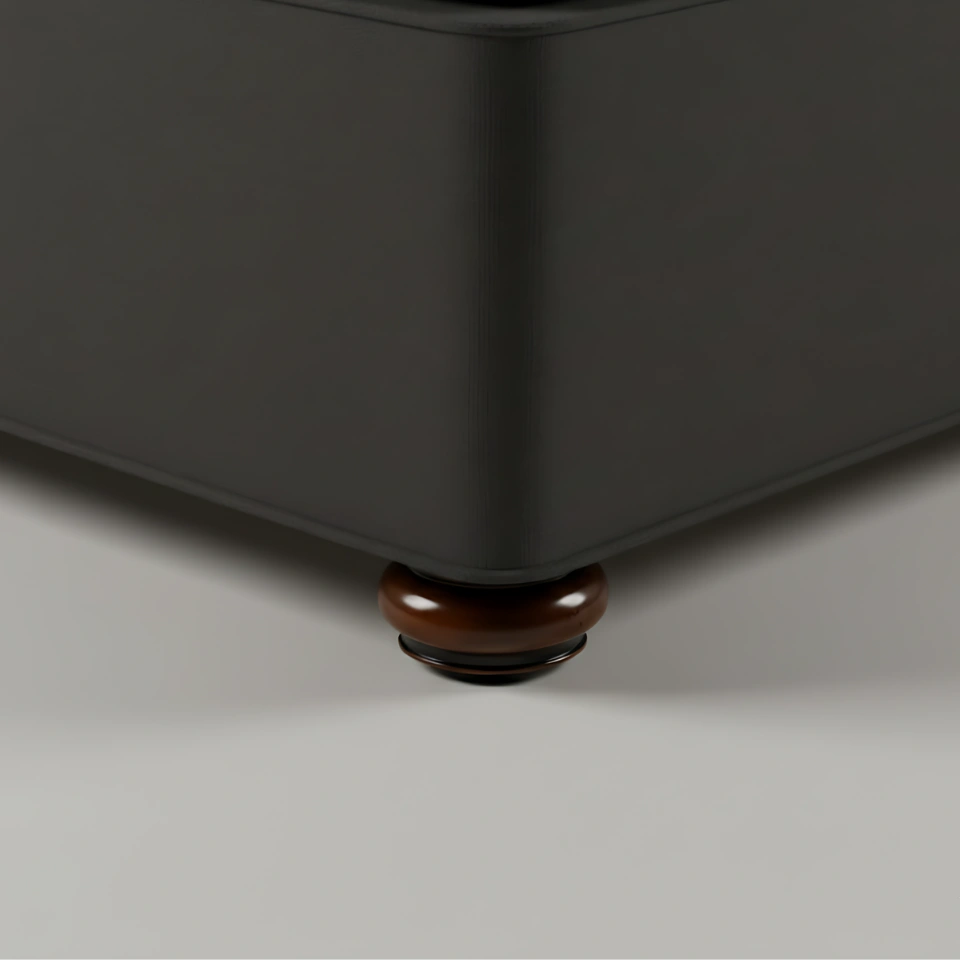 Turnedbun bed leg supporting a bed